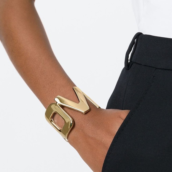 Givenchy Jewelry - ♦️SOLD♦️$890 AUTHENTIC GIVENCHY GOLD LOGO BRACELET